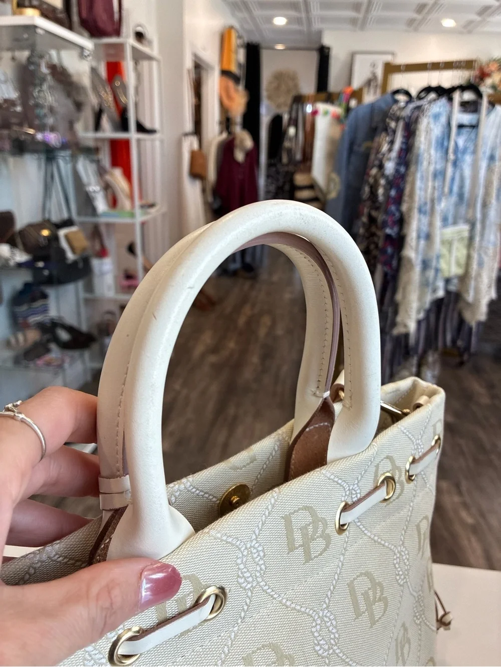 Dooney & Bourke Cream Satchel with Tassel and Gold Hardware